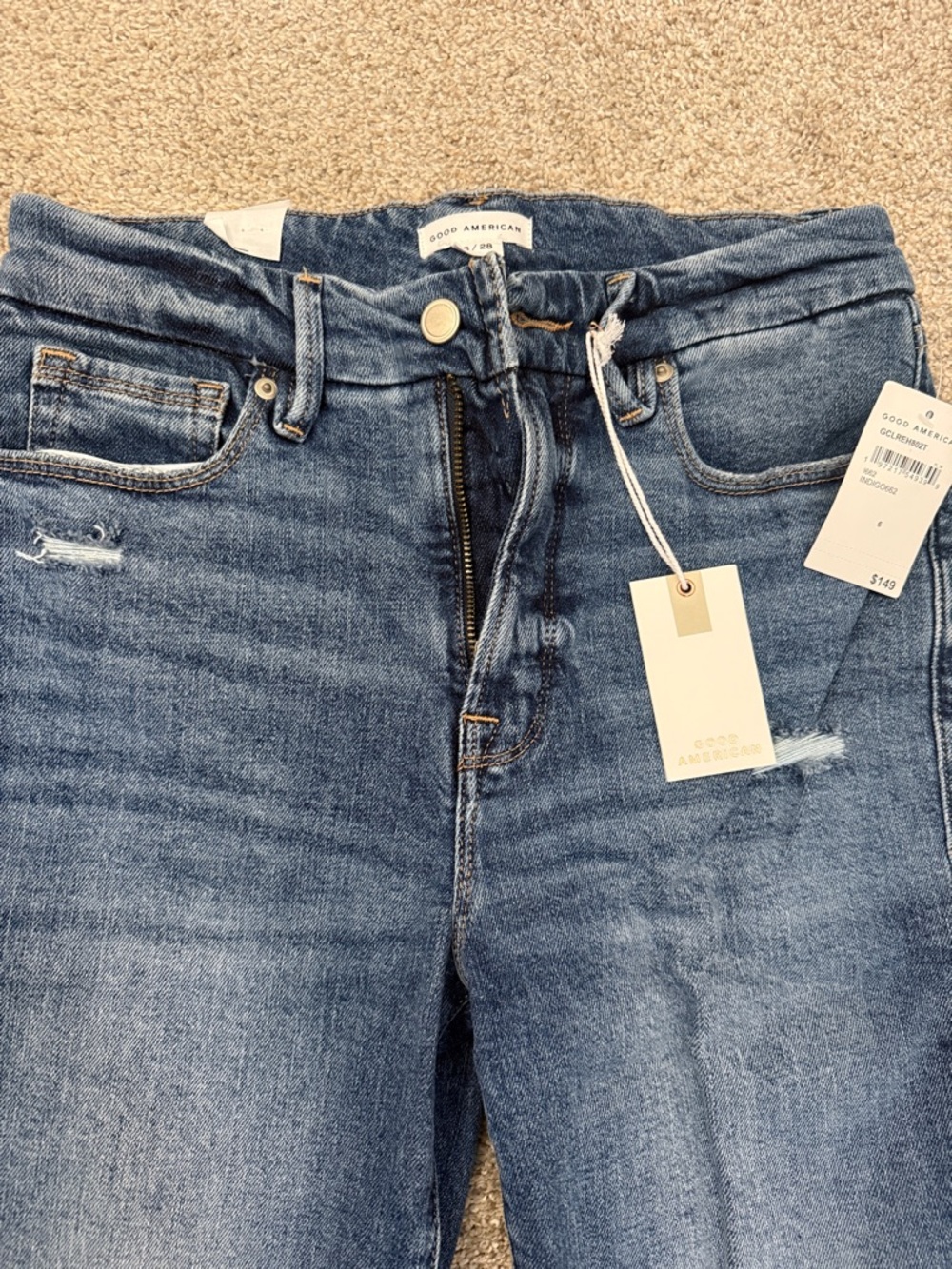 Good American High-Rise Light Blue Distressed Jeans